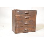 A C19th pine nest of four drawers, with cup handles. 21" x 11" x 21"