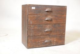 A C19th pine nest of four drawers, with cup handles. 21" x 11" x 21"