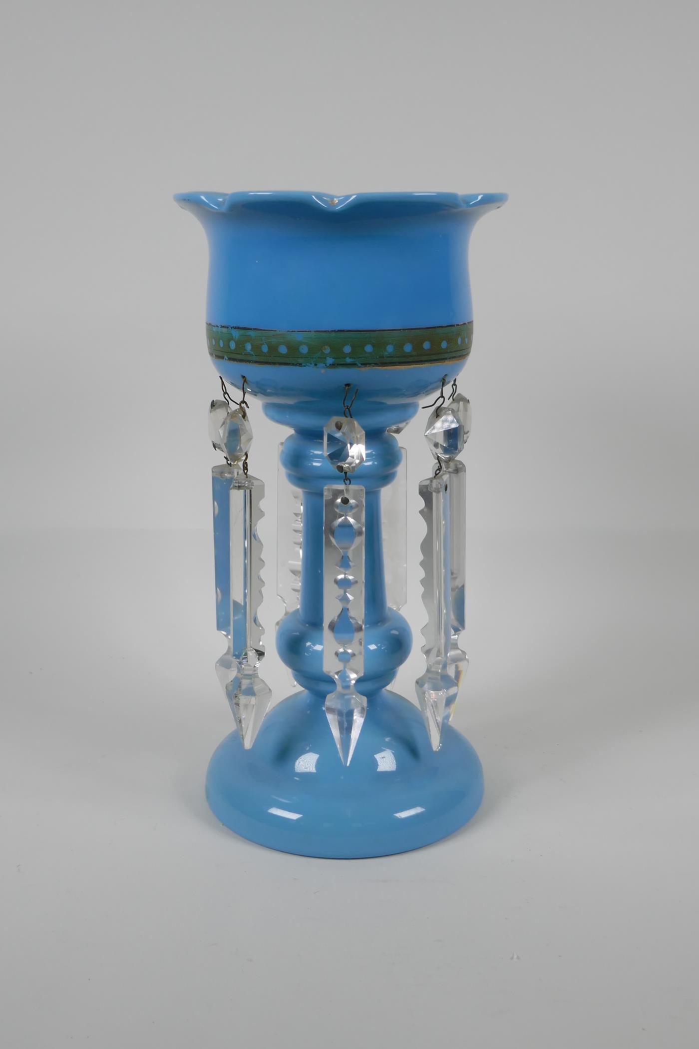 A blue milk glass lustre, with gilt details & prismatic lustres. 11" high