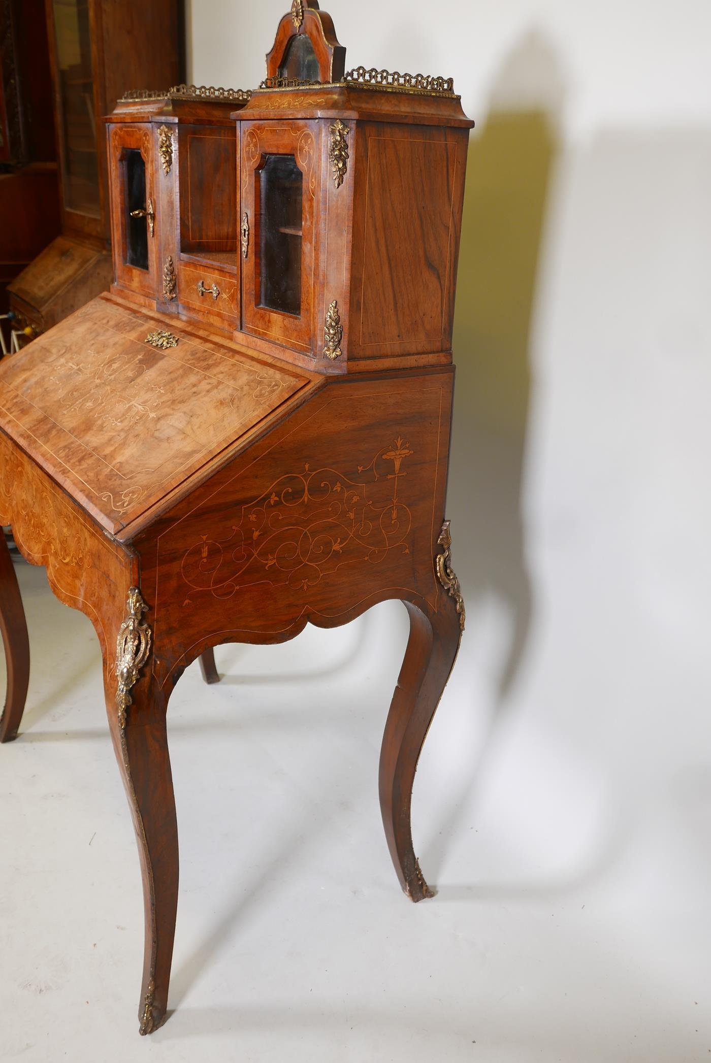 A Victorian inlaid, figured and burr walnut bonne-heure-de jour, with a brass galleried top and - Image 6 of 7