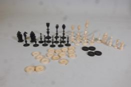 An early C19th, Indian ivory & horn chess set, King 4" high, set incomplete and chequers pieces