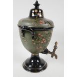 A C19th Russian pottery tea urn, with embossed floral decoration, 15" high