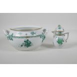 A Herend porcelain, with green Chinese bouquet pattern, two handled pot. And milk jug. AF. Largest