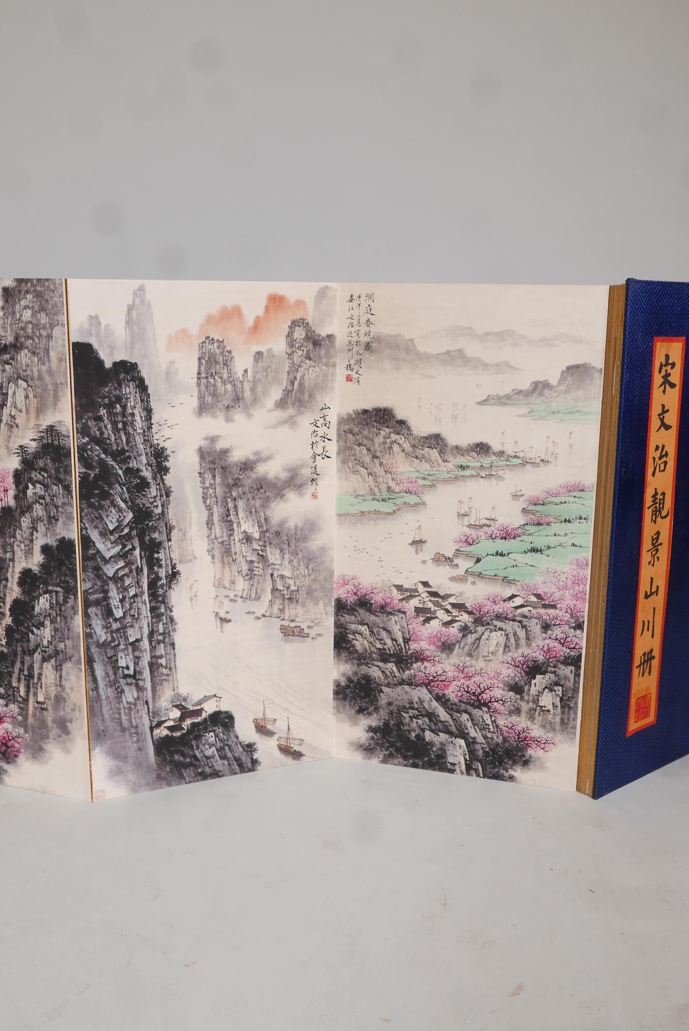 A Chinese concertina book, containing ten mountain and riverside landscapes, overpainted prints - Image 8 of 9