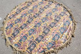 A large Victorian woven table cloth, with gilt tassled fringe, 84" diameter