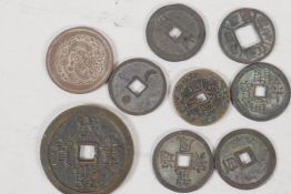 A quantity of various Chinese replica coins, largest, 2" diameter