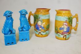 A pair of majolica jugs decorated with a pipe smoker and a snuff taker, 10" high, and a pair of