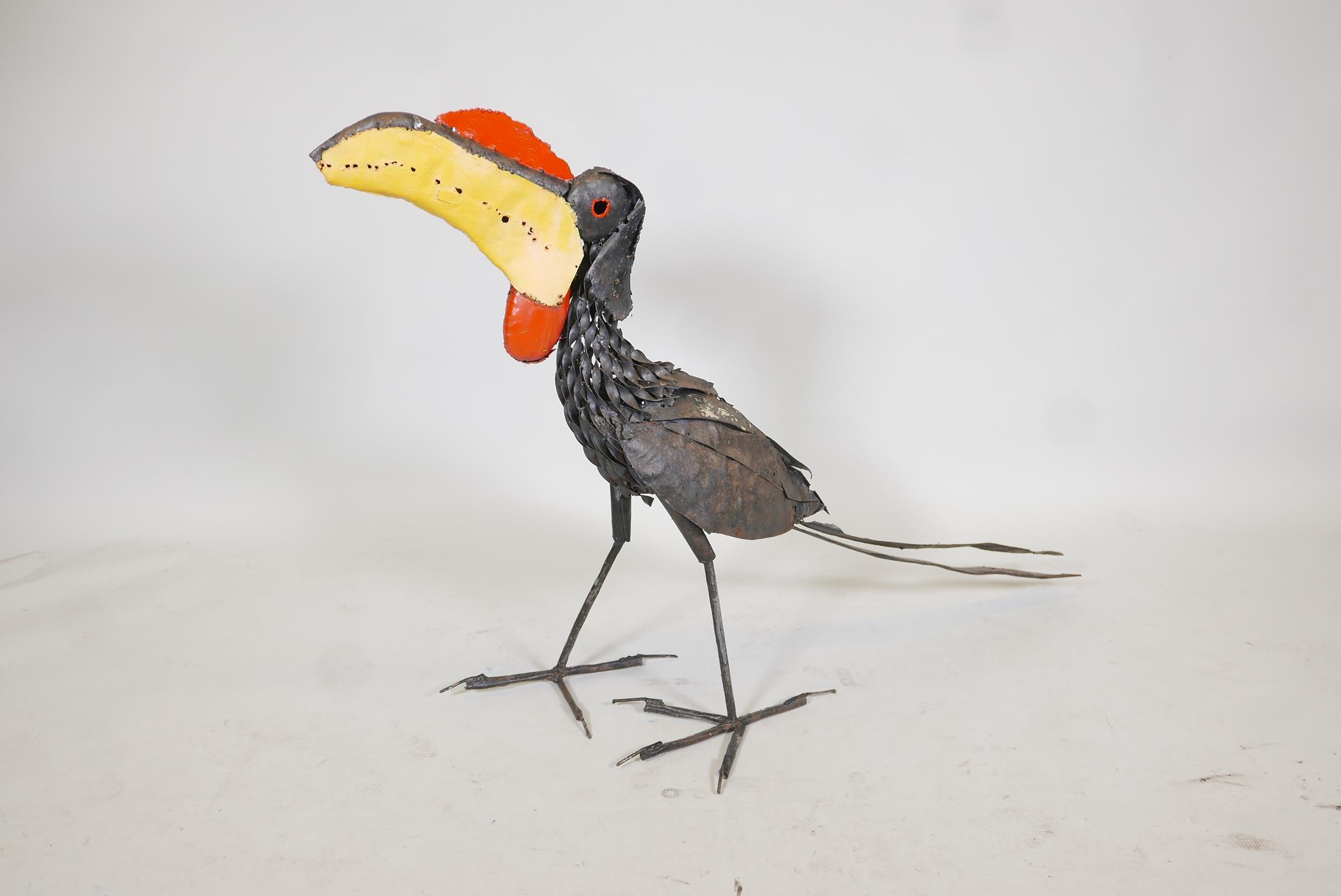 A painted iron sculpture of a toucan, 31" high