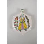 A Turkish Kutahya pottery flask with painted figural decoration, 6" high