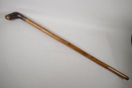 A hedgerow walking stick, with removable handle and glass vial set into the shaft, 37" long