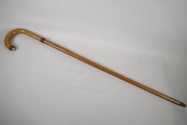 A spiral decorated walking stick, with bone handle. 37" long