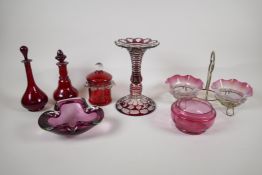 A collection of C19/20th Ruby & Cranberry glass. Including a lustre, perfume bottles, pots,