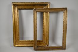 Two early C19th giltwood picture frames, having carved bead decoration. Largest rebate 15" x 10½"