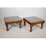 A pair of Indian iron bound occassional tables, on turned supports. With brass mounted