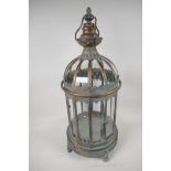 A copper plated metal and glass cylindrical garden lantern. 24" high