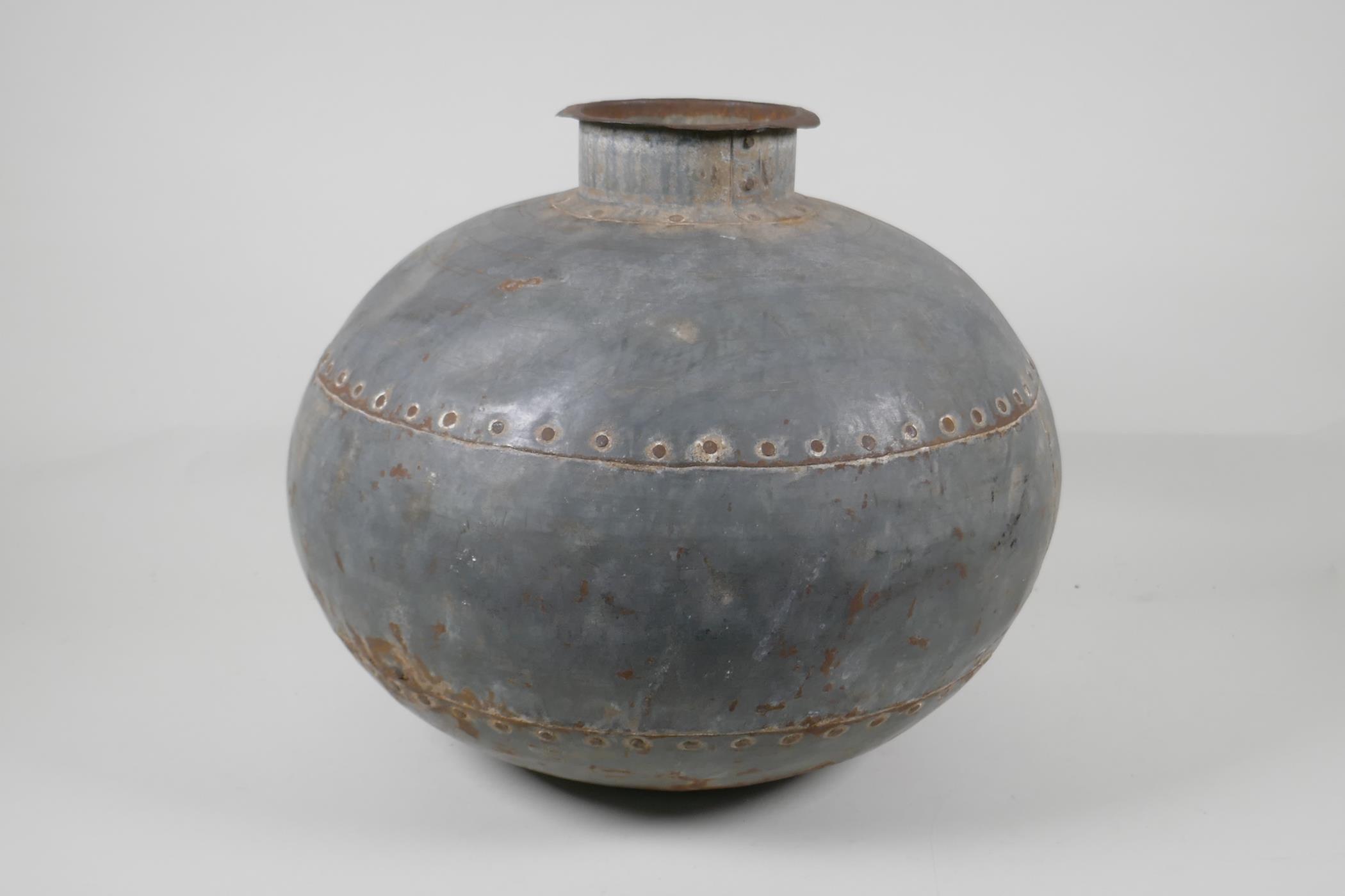 An Indian riveted metal pot/jar, 13½" diameter - Image 2 of 4