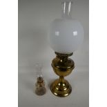 A brass duplex burner oil lamp with milk glass shade, 20" high, and a small moulded glass oil lamp