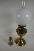 A brass duplex burner oil lamp with milk glass shade, 20" high, and a small moulded glass oil lamp