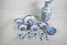 A Chinese blue and white service of serving bowl, four rice bowls, sauce dishes, spoons and rests,