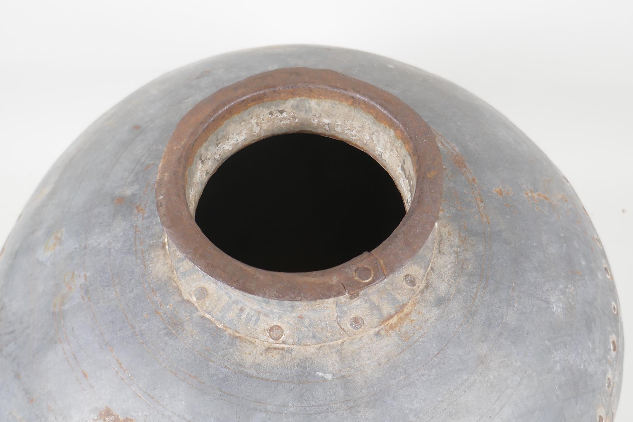 An Indian riveted metal pot/jar, 13½" diameter - Image 3 of 4