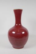 A Chinese sang de beouf glazed porcelain vase, 6 character mark to base, 14" high