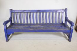 A painted teak garden bench, 72" long
