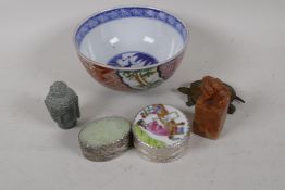 A Chinese porcelain bowl, decorated with branches and geometric panels, 5" diameter. A soapstone