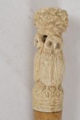 A C19th Ivory Dandy cane handle, carved as three owls. 4" long