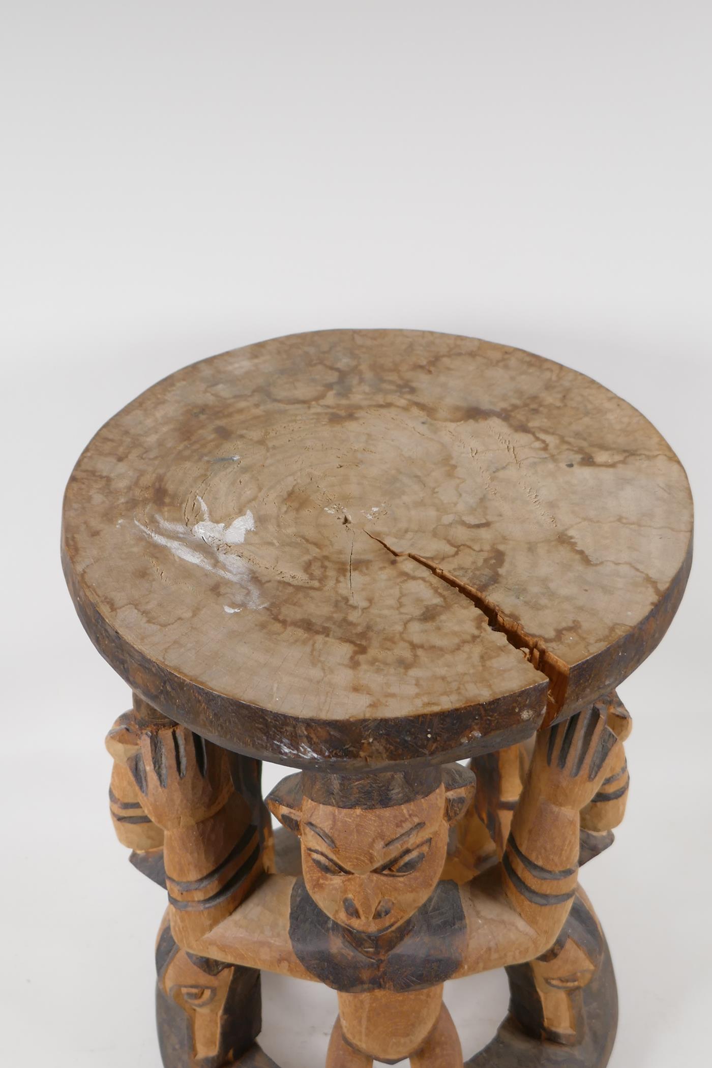An African carved & stained wood figural stool. 16½" high x 12" diameter - Image 4 of 4