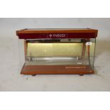 A Parker pens illuminated table top display cabinet. AF, 22" x 13" x 14"