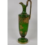 A C19th green glass wine ewer, with vine leaf and Greek key. Gilded decoration, 12¼"