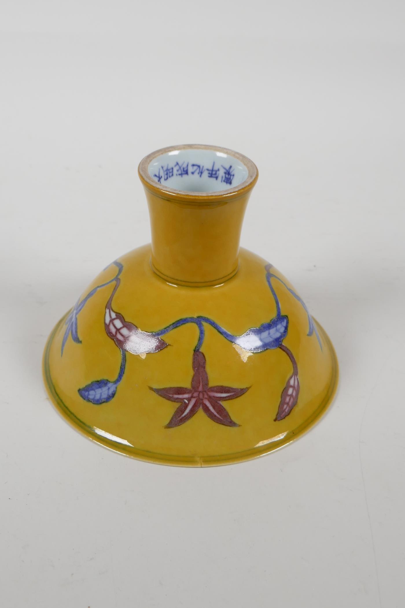 A Chinese yellow ground porcelain stem bowl with red and blue floral decoration, 6 character mark to - Image 3 of 4