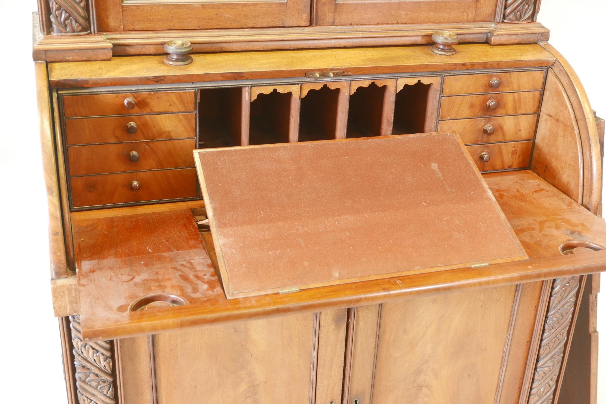 A Victorian cylinder top bureau bookcase, the upper section with two glazed doors and carved - Image 5 of 6
