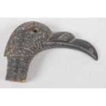 A C19th horn parasol handle, carved as as ducks head. 2" long