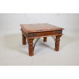 A fruitwood coffee table with iron mounts. 24" x 24" x 16" high