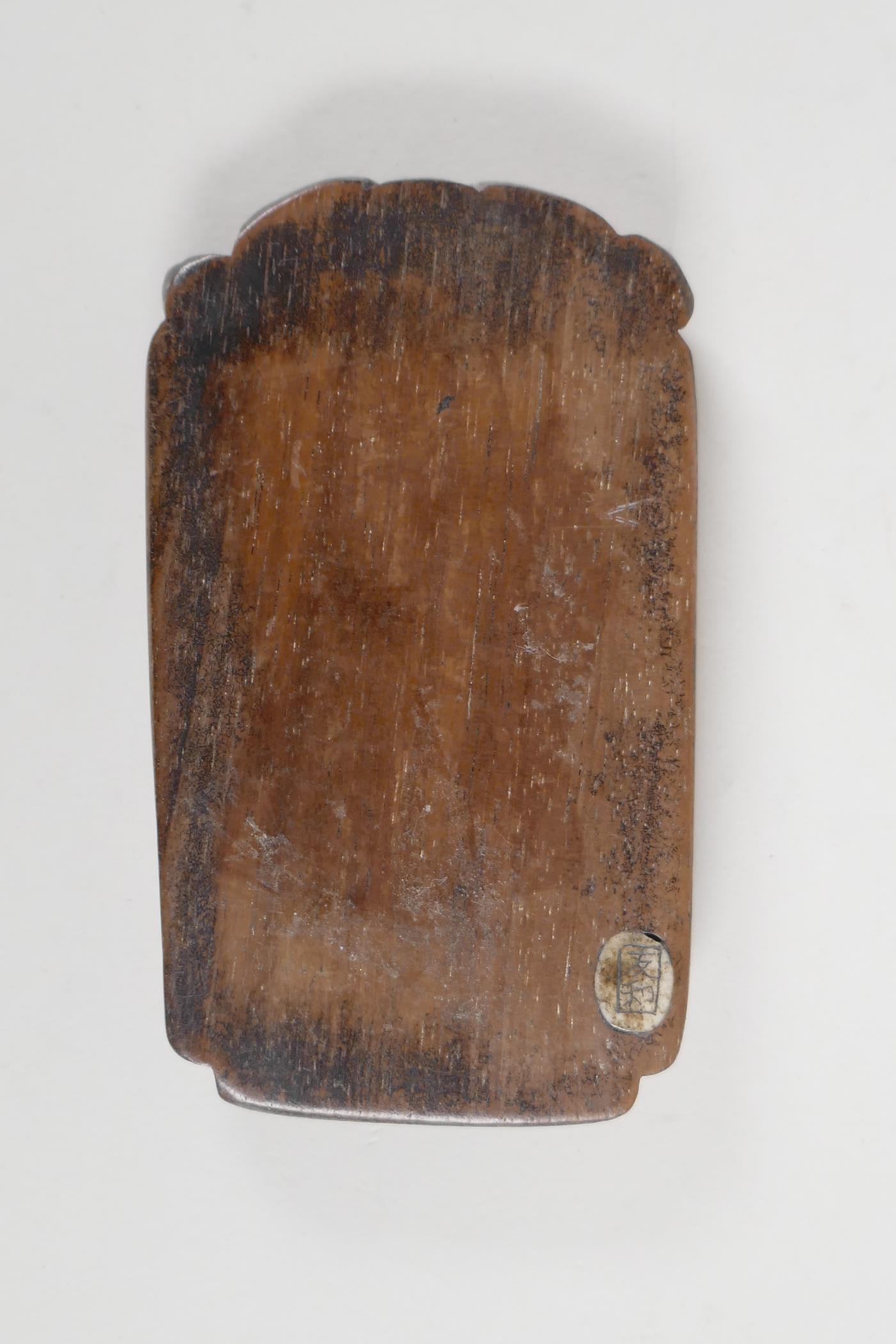 A Japanese carved wood and bone plaque, 2¾" long - Image 2 of 3