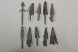 Ten Archaic style bronze arrowheads, 3" largest