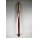 A replica mercury stick barometer in a mahogany case from Comitti of London, with instructions