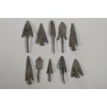 Ten Archaic style bronze arrowheads, largest 3"