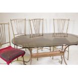 A vintage brass conservatory table, with tinted glass top & four chairs ensuite. 30" x 53"