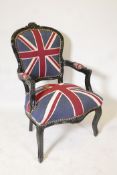 A Louis style black painted armchair upholstered in Union flag material