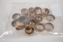 A quantity of gilt metal ferrules, various diameters