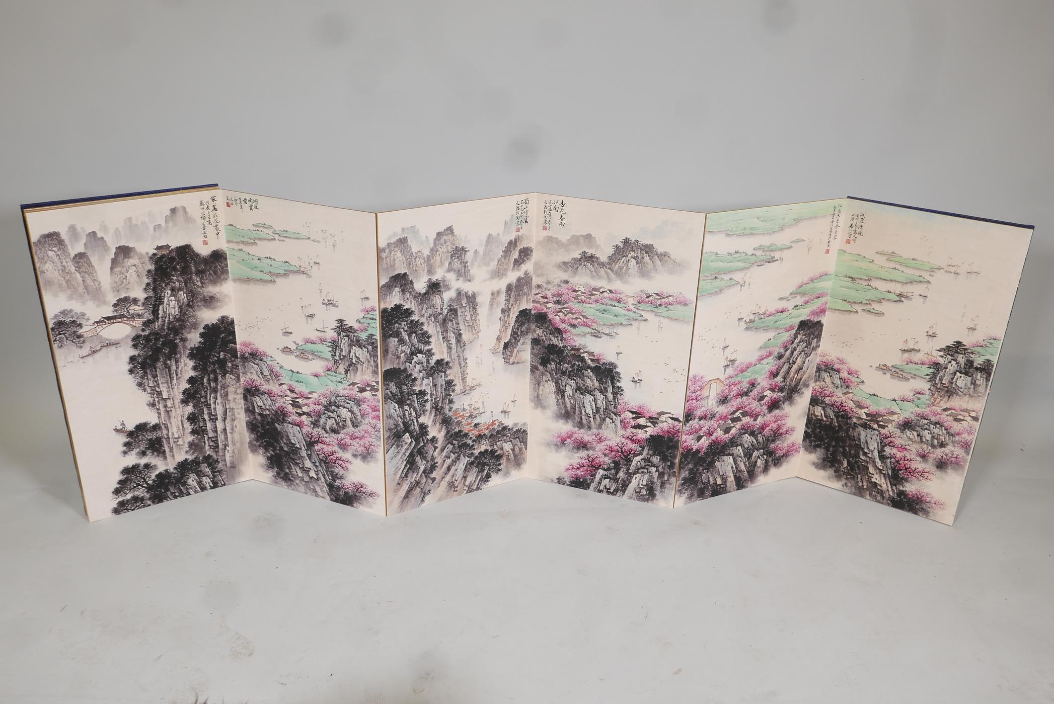 A Chinese concertina book, containing ten mountain and riverside landscapes, overpainted prints - Image 2 of 9