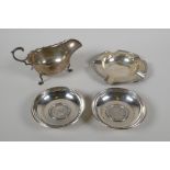 A pair of hallmarked silver coin dishes, London 1962, containing an 1847 Victoria young head crown