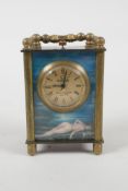 A miniature brass carriage clock with pictorial enamel panels, 3" high