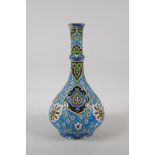 A continental pottery bottle vase, with enamelled Iznik style decoration. Impressed L.W to base. AF,