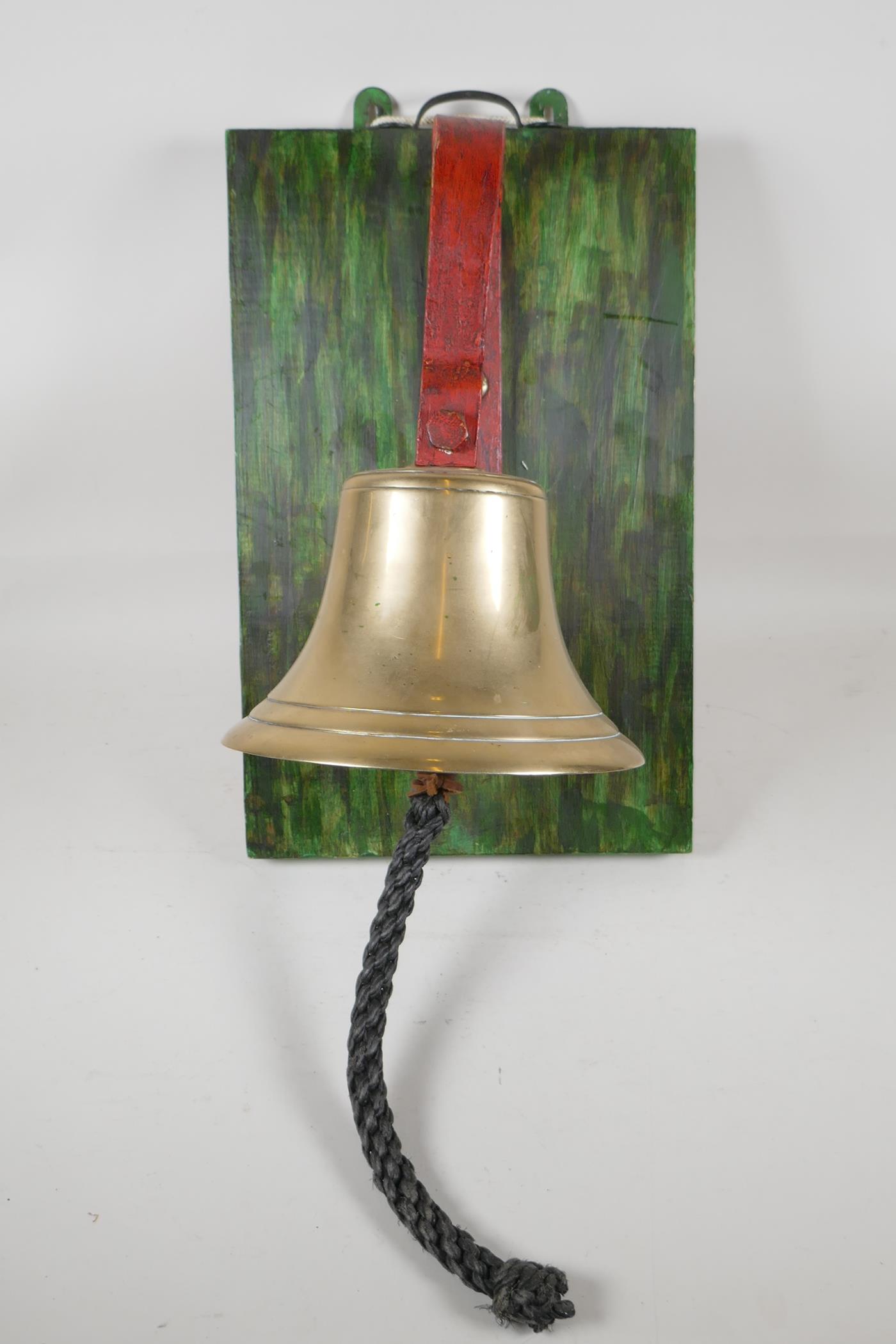 A brass school bell/dinner bell, 16" high