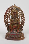 A Sino Tibetan gilt bronze figure of a wrathful deity, 6" high