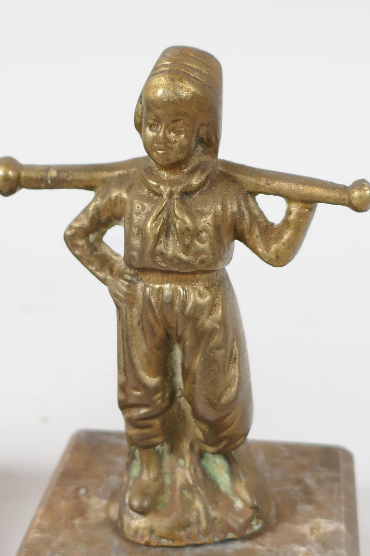 Two small brass/bronze figurines of Dutch Children, carrying yokes on their shoulders, mounted on - Image 2 of 3