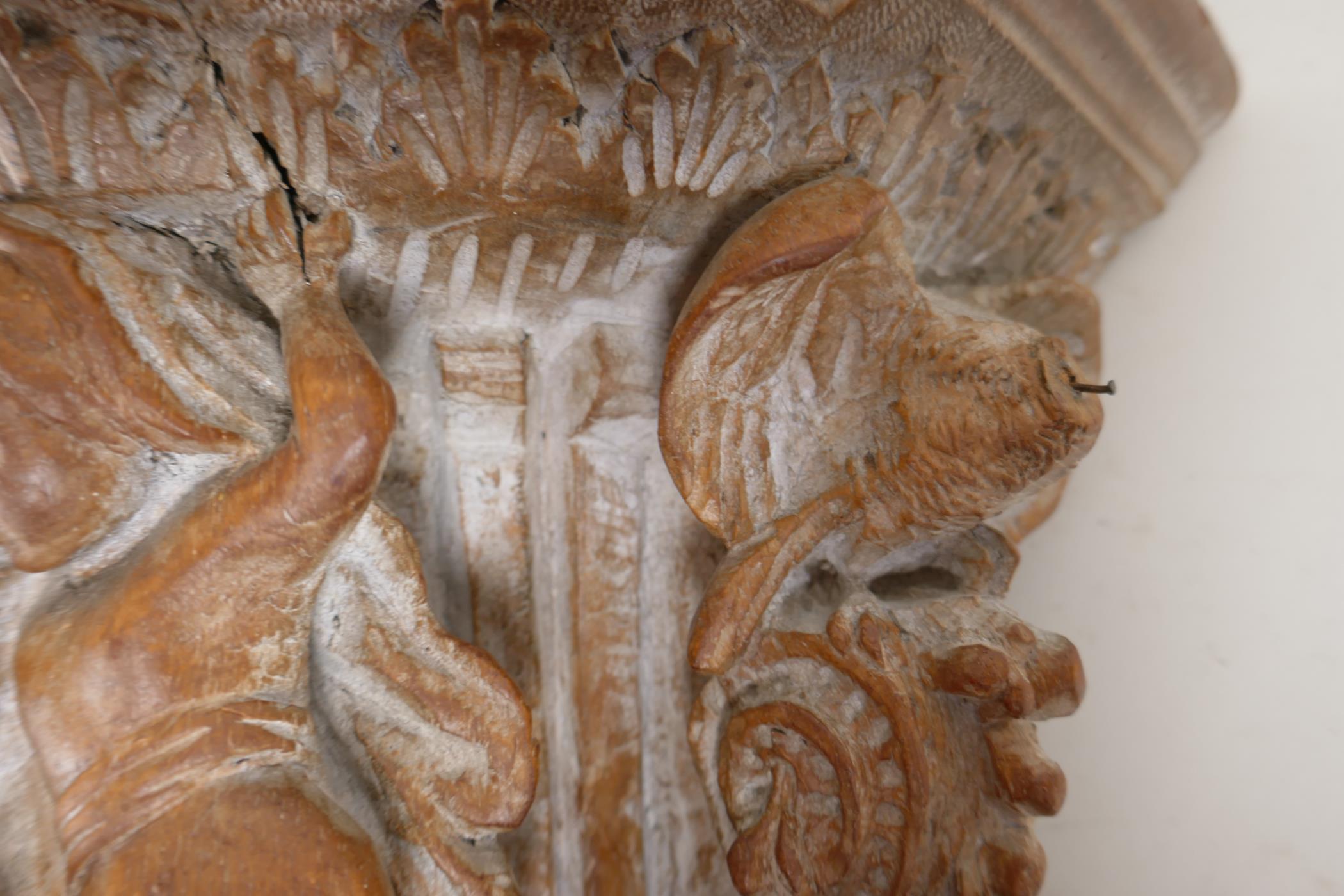 An ornately carved wood wall bracket. Carved in the form of a classical column capital. 13" long - Image 4 of 5